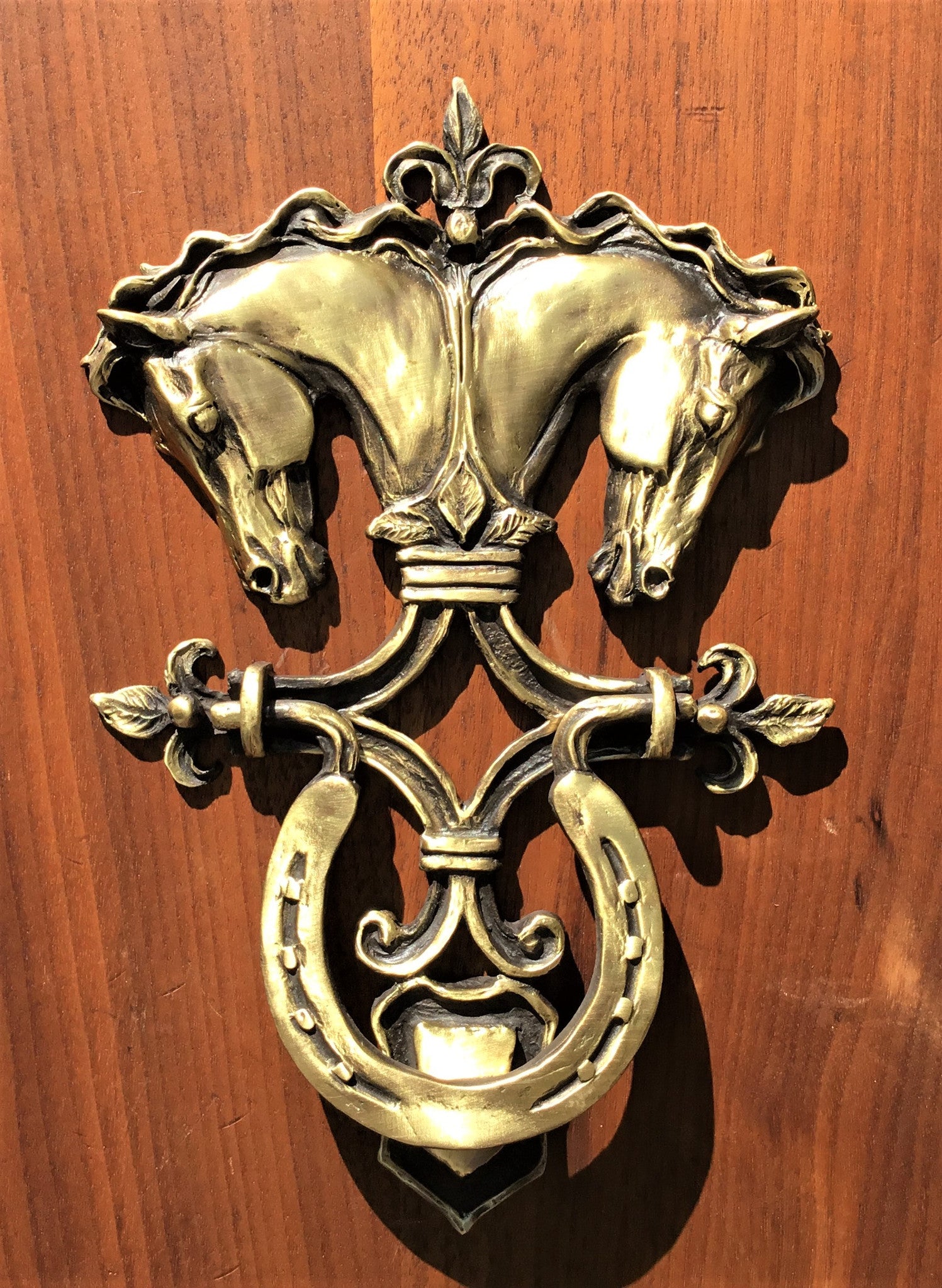 Horse head door knocker with classical design